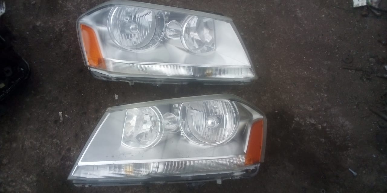 FAROS DELANTEROS DODGE AVENGER 2008 AL 2014